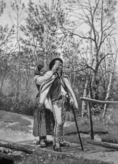 Woman covering a man's eyes with her hands