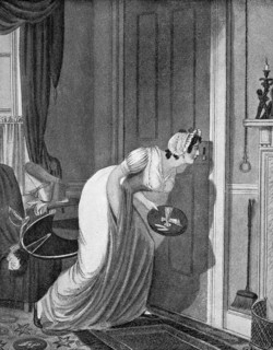 Woman peeking through a keyhole