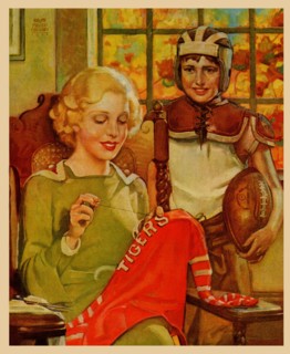 Mother sews her son's football Jersey as he looks on 1935