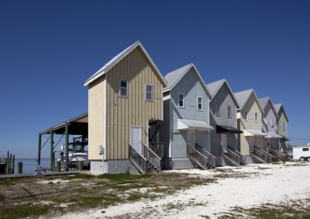 Fishing houses line the beach on Dauphin Island, Alabama 2010
