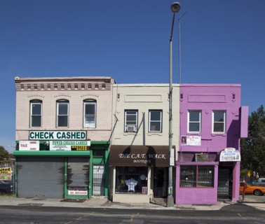 Bar, Boutique & Check cashing in poor Neighborhood 2010