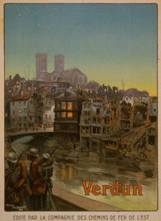 Soldiers marching beside a river and over a bridge into a shelled Verdun. The battle of Verdun in 1916 was the longest and costliest battle -- in terms of lives -- of the war. 1916