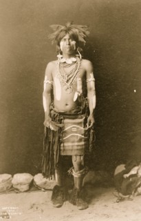 Snake dancer in costume 1900