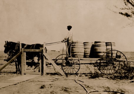 14-year-old boy hauling water on farm near Lawton. Francis Heinz, Route B, Box 11.  1917