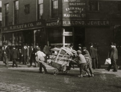 3 Boy Woodpickers Under Way lugging a cart full of firewood. 1909