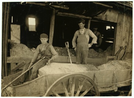 A Boy (may be over 14) at Heavy Work. Shoveling Ore at Daisy Bell Mine, Aurora, Mo. 1908
