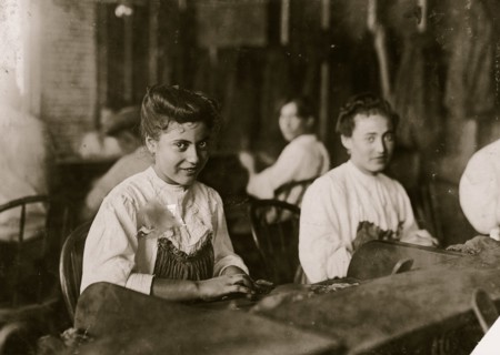 A Tampa, Fla., cigar maker adolescent. Many beautiful girls and women in the business. 1909