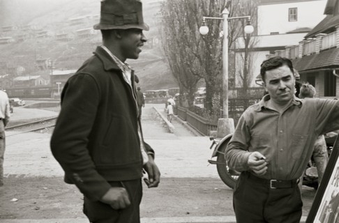 African American and a while man look at a sign 1935