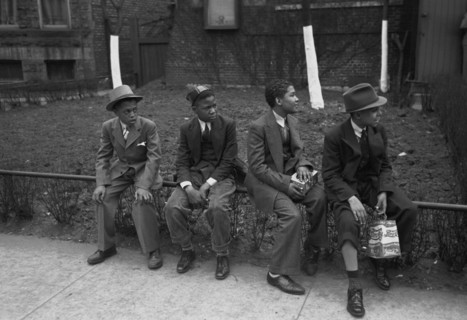 African American Boys waiting outside of Episcopal Church to see the processional, South Side of Chicago, Illinois 1938