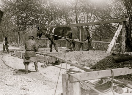 African American drilling a well with a horse on a turnstile 1914