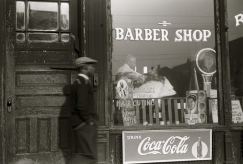 African American outside Barber shop in the Black Belt, Chicago, Illinois 1941