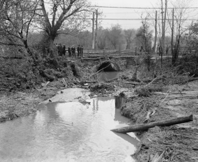 African Americans examine the build up of detritus from Flood in Washington, DC 1923