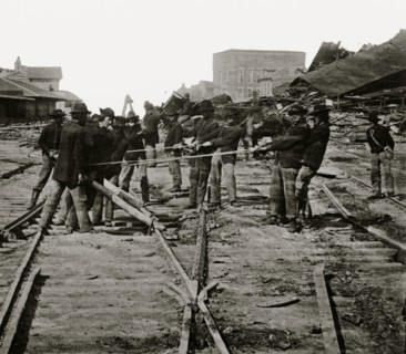 Atlanta, Georgia. Sherman's men tearing up railroad track 1864
