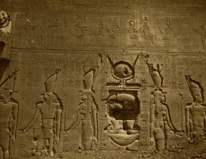Bas-relief and hieroglyphics cover wall in the Temple of Hathor, located in Dendara, Egypt. 1880