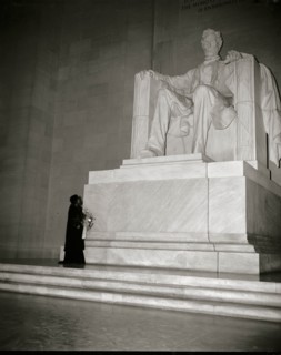 Marion Anderson before a statute of President Lincoln in the Memorial in DC 1939