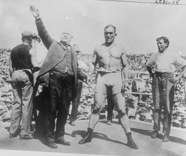 Boxer and announcer in boxing ring