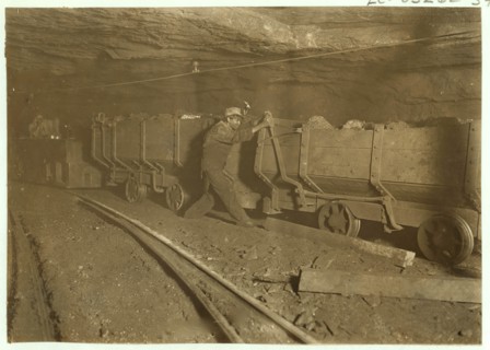 Boy braking on motor train 10 hrs. a day.  1908