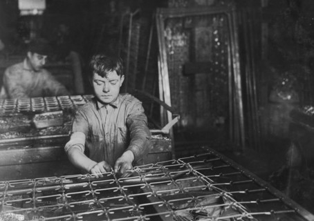 Boys "linking" bed-springs. 14 and 15 years old. 1917