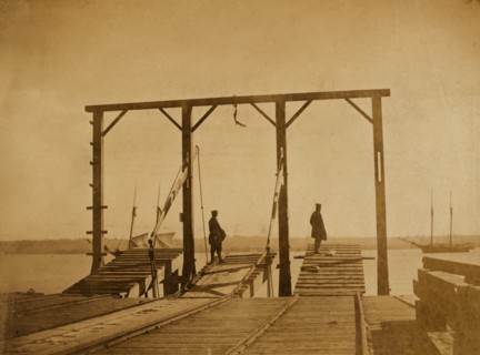 Bridges by means of which cars are loaded upon or unloaded from arks or barges 1863