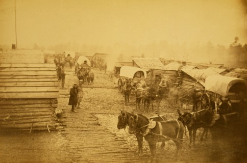 Camp of the Union forces at Centreville, Virginia, showing soldiers, log buildings, horses and wagons, during winter of 1861-1862 1861