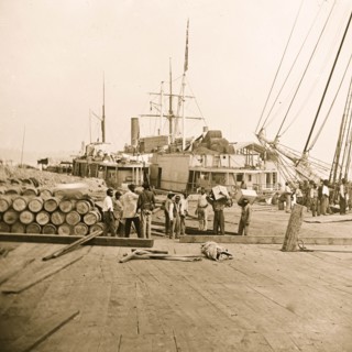 City Point, Virginia. Blackes working along the wharf 1863