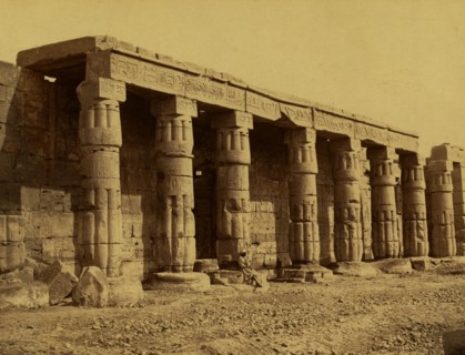Colonnade on side of temple in Karnak. 1880