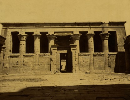 Courtyard and temple with columns connected by panels; Temple of Edfu 1880