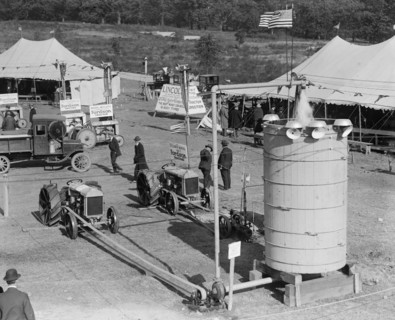 Fordson Tractors on Display at an open air exhibition with tents and a jerkwater 1918