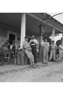Suiting up for Baseball at the Gasoline Station 1939