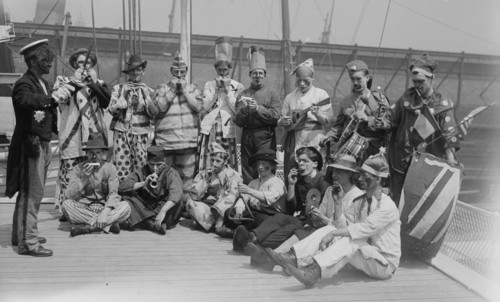 Celtic Firefighters in Dress up band as Clowns with Musical Instruments