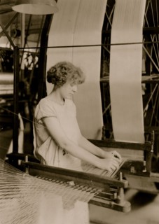 Girl works at Silk Thread machine 1924