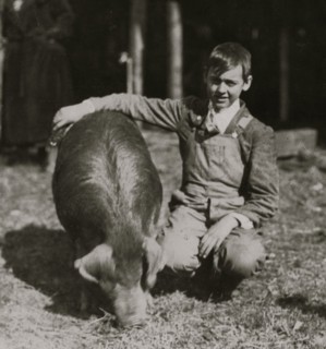 Guy Baily, prize winner, - a 14 year old Club Member from Lewis Co. with his exhibit. State 4 H Club Fai 1921
