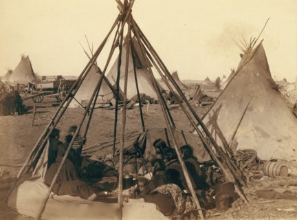 Home of Mrs. American Horse. Visiting squaws at Mrs. A's home in hostile camp 1890