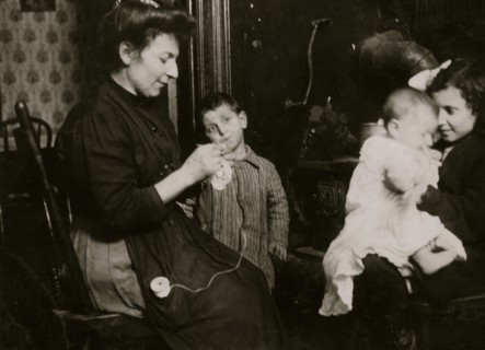Italian Families manufacture lace from their tenement apartment 1911