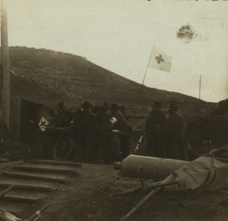 Lifting a wounded Russian to a bicycle stretcher 1905