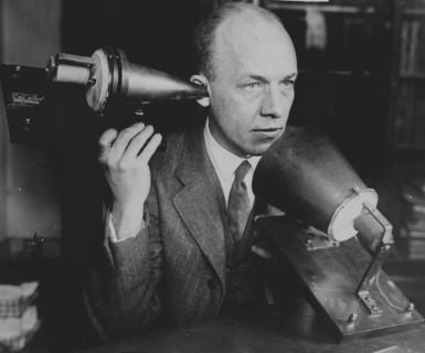 Man Hold's Bell's First Telephone 1920