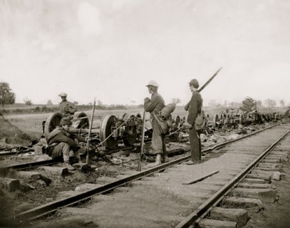 Manassas Junction, Va. Soldiers beside damaged rolling stock of the Orange & Alexandria Railroad 1862