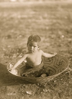 Toddler in Basket 1907