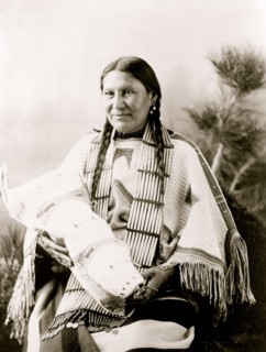Mother Mary Martin holding cradleboard 1900