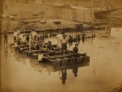 Military construction in northern Virginia: raft of blanket boats ferrying men and timber across the Potomac River