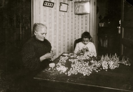 Mrs. Monte Mora, Fifty-five years old, is janitress for a large tenement, 133 W. Houston St., (lives Apt. 7) housing 26 families. When not tending the furnace or occupied with other duties for others ...