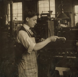 Operating an automatic press. Boston Index Card Co., 113 Purchase Street. 1917