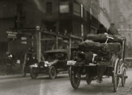 P.M. Delivery boys on Tremont Street, "getting a hitch." 1917