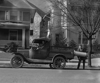 Plumbing & Heating Contractors Unload a Boiler 1926