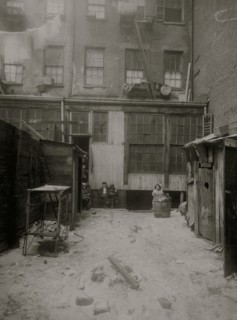 Rear view of tenement, 134 1/2 Thompson Street, New York City. See Photos of flower makers working here 1912