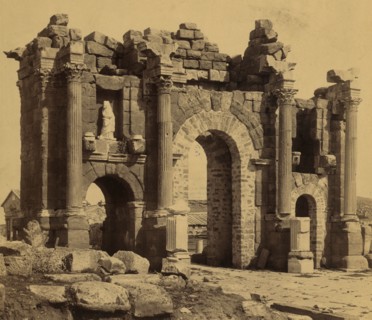Remains of Roman Arch of Trajan at Thamugadi (Timgad), Algeria. 1875