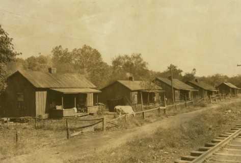 Row of Coal miners shanties on Elk River at Bream, W. Va. Location: Bream, West Virginia  1913