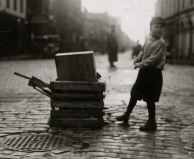 Scavenger Totes Wood and pulls heavy dolly 1916