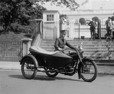 Sergeant Reiny a Policeman in a motorcycle with side car in front of the White House 1922