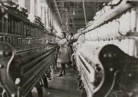 Spinner in Bibb Mil No. 1, Macon, Ga. Bad lighting and ventilation in spinning room.  1909